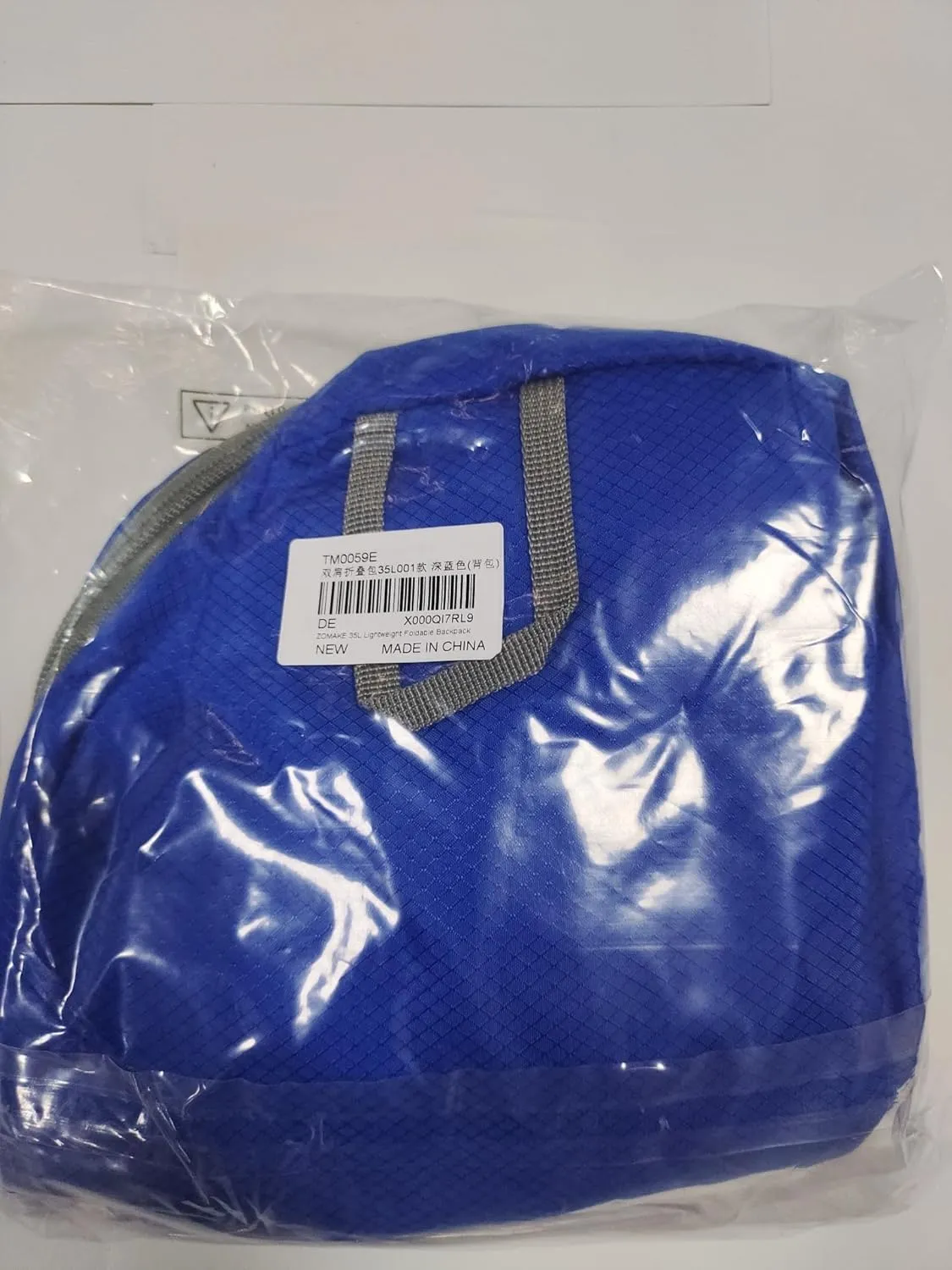 ZOMAKE Lightweight Packable Backpack 35L, Light Foldable Backpacks Water Resistant Collapsible Hiking Bag, Compact Folding Day Pack for Travel Camping(Dark Blue)